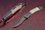 minnick gold lip wire gold inlays persian heat blued $2500.jpg