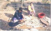 village sarkil prakash, chucking wood..jpg