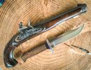 BUCK Tactical w flintlock.jpg