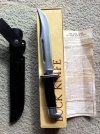 Buck 120 with swing sheath.jpg
