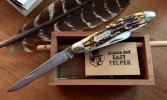 Schrade 897UH + turkey call & feather.jpg