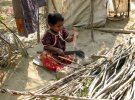 Rohingya refugee girl sell firewood - machete.jpg