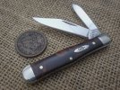 Case maple burl on burlap with 1853 penny.jpg