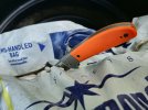 Civivi Trailblazer cutting bag of salt.jpg