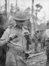 soldier spreading butter on a cracker with mkii.jpg