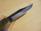 knife folder Old Timer T70 blade R side good light on grind.jpg