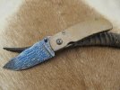 carved mini framelock 010.jpg carved mini framelock 010.jpg