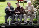 dresden-germany-men-sitting-on-a-park-bench-DTARBF.jpg