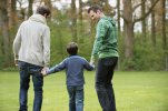 rear-view-of-a-boy-walking-with-two-men-in-a-park-157860374-57edc81e3df78c690f2ba883.jpg