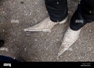 closeup-of-man-wearing-pointy-shoes-DEXJRP.jpg