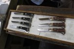 IMG_9927 72 GEC HOOF PICK KNIVES, GABON EBONY AND STAINED JIGGED MUSLIN MICARTA. SHOWN IN HONING.jpg