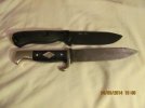 Becker German BS Knife Pile Side.jpg