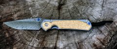 CRK  Sebenza 31 large Box Elder Burl Damascus.jpg