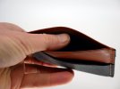 black orange wallet hand 2.jpg