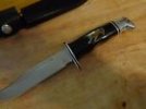 buck 119 silver inlay puma.jpg