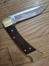 Buck 110 Micarta 5160 blade.jpg