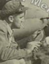 soldier using khukuri to trim nails-crop.jpg