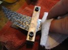 21Cleaning tang with acetone prior to gluing bolster on.jpg