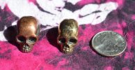 bronze and copper half skulls.jpg bronze and copper half skulls.jpg