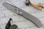 trevor-burger-custom-knives-lexk-framelock-GR5-titanium-damasteel-damascus-drop-point-front_2048.jpg