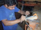 Wilmer filing his first knife.jpg