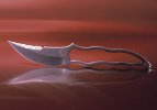 mod scorpion neck knife.jpg