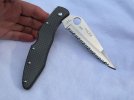 spyderco carbon police serraded.jpg