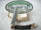 Buck 110 NS Damascus Drop Point Black Corncob Jigged Bone #2.jpg