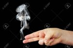 19712052-smoke-from-the-fingers-of-a-hand-depicting-a-gun-a-photo-on-a-black-background-.jpg