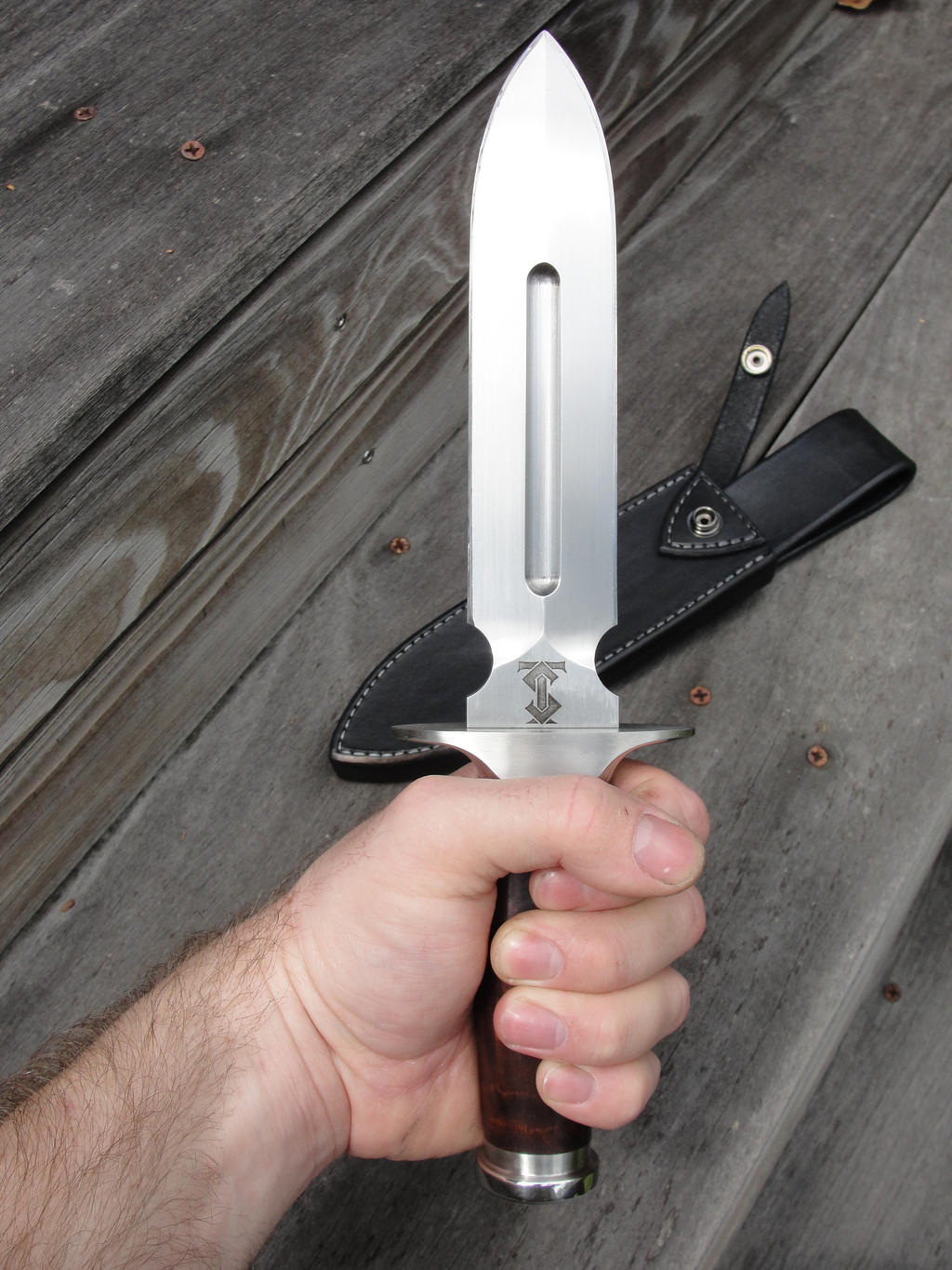 dagger_in_hand_by_cardman-db7fw07.jpg
