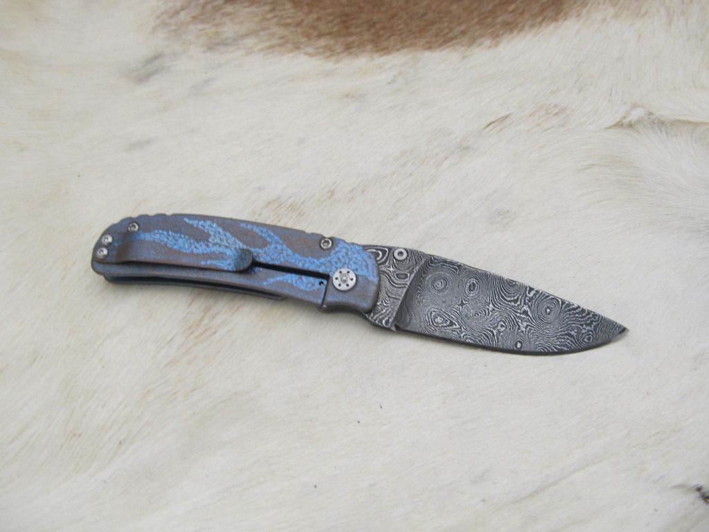 CarvedTiFramelock025.jpg