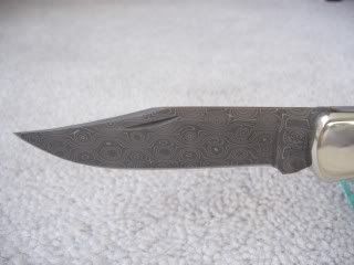 Buck110Damascuscustomshopcherry2.jpg