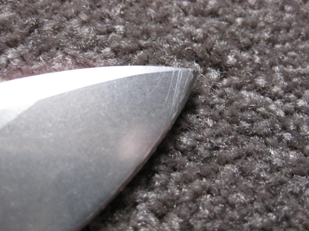 BM630SkirmishBladeScratches_zps7f360a8d.jpg