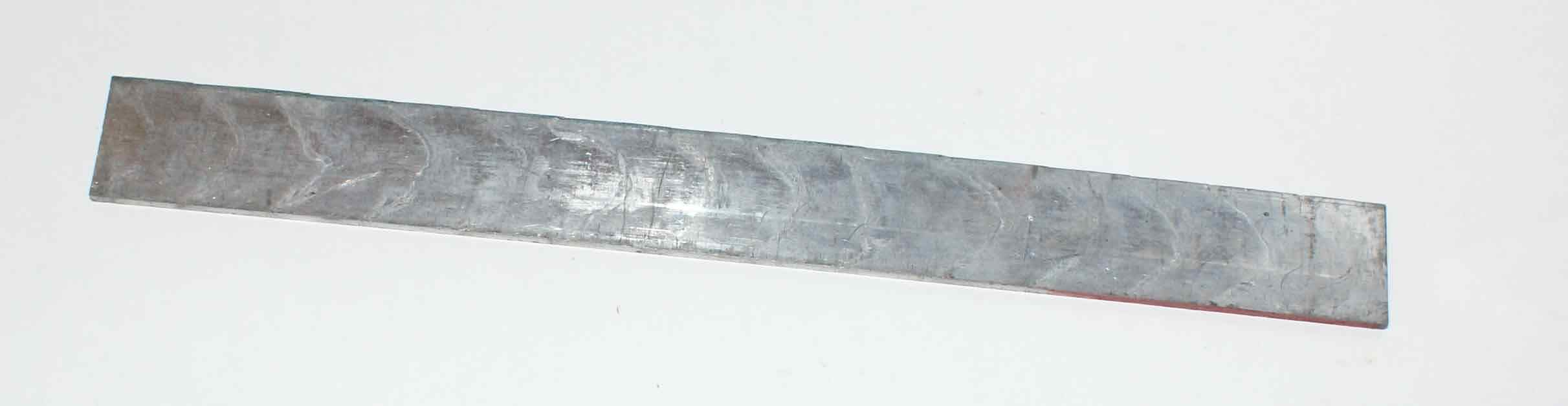 Metal_strip_cast_by_Elrod_machine.jpg
