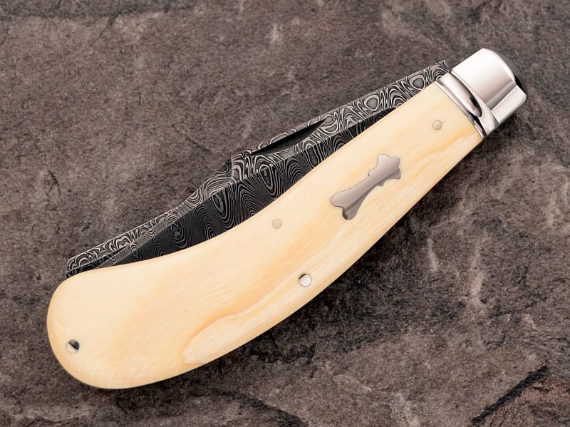 tbose-458hansondamascus-ivorysaddlehorn-1.jpg