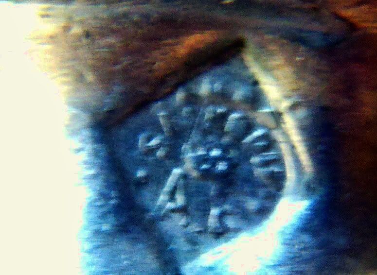 1314585209-symbol2.jpg
