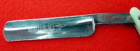 Straight_razor_kukri_blade.jpg