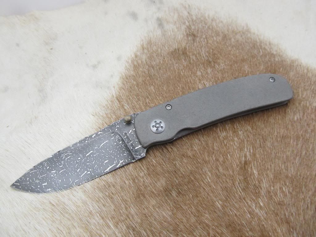 Stainlessdamascusfrramelock003.jpg