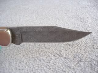 Buck110Damascuscustomshopcherry4.jpg