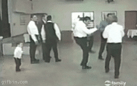 1239353531_kid-kicked-in-the-face.gif