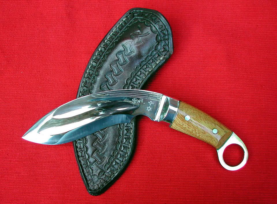 Kerambit-on-sheath-medium.jpg