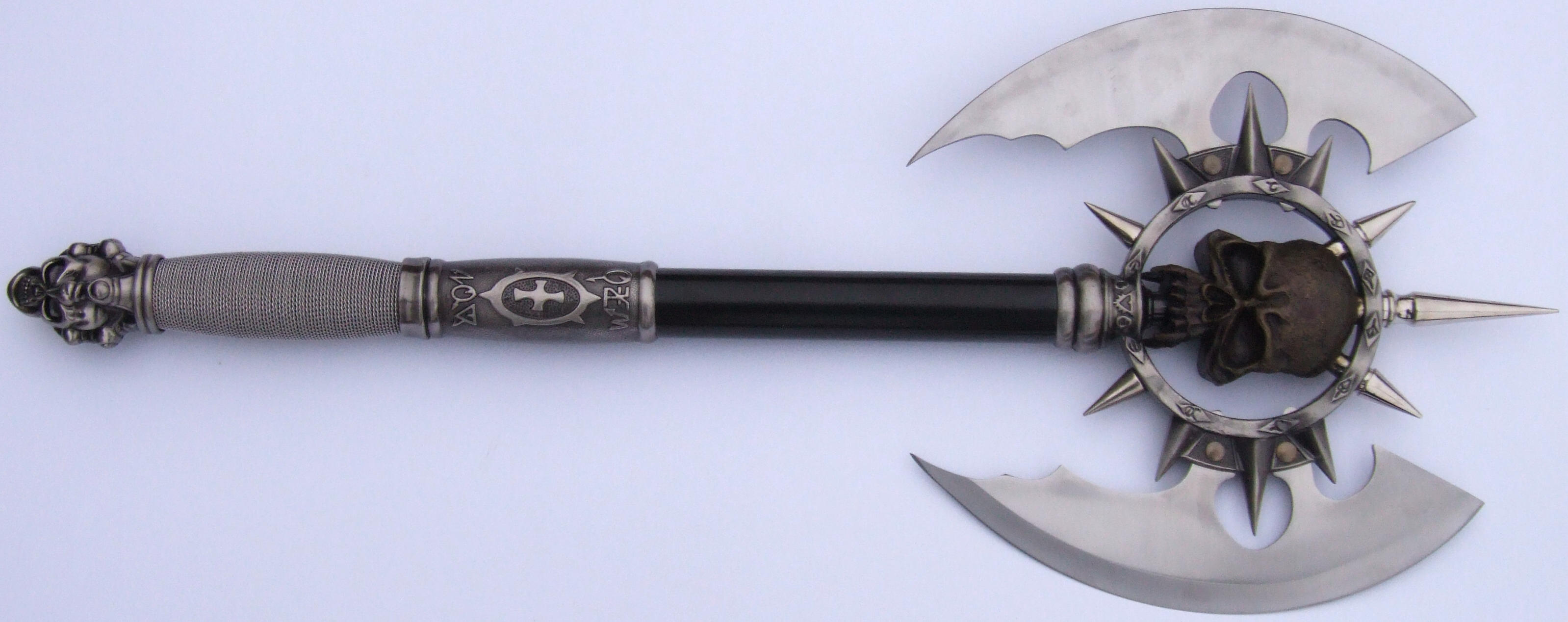 conjal__s_huge_skull_battle_axe_by_fantasystock.jpg