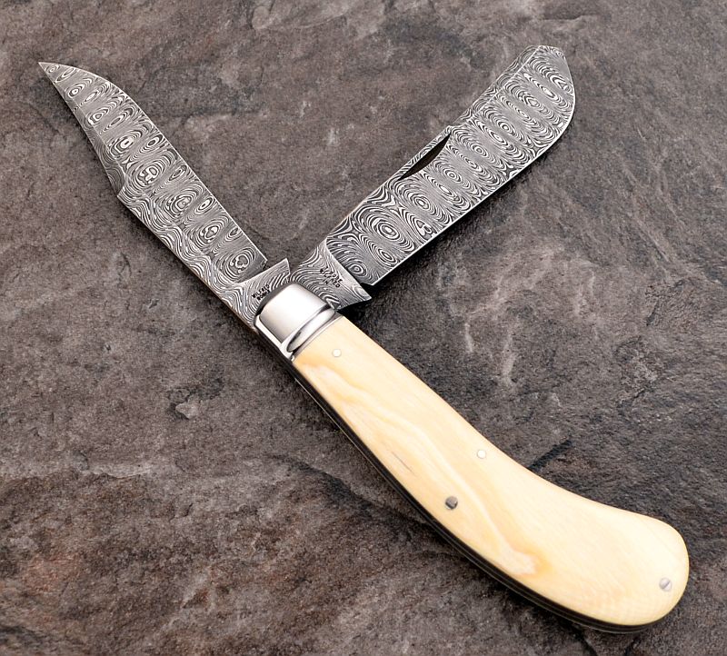 tbose-458hansondamascus-ivorysaddlehorn-3.jpg