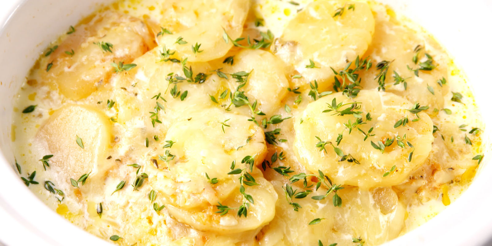 landscape-1491859543-delish-slow-cooker-scalloped-potatoes-2.jpg